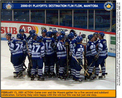 Waxers celebrate briefly after win moves them to round two.