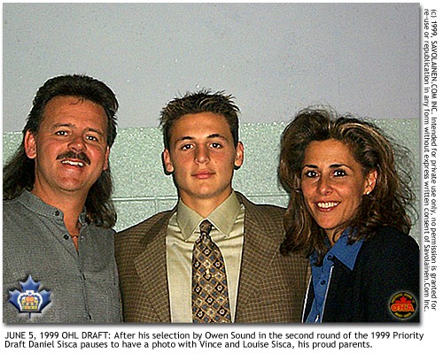 Daniel Sisca with proud parents